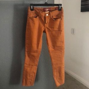 Lucky brand burnt orange jeans. Size 0/25.